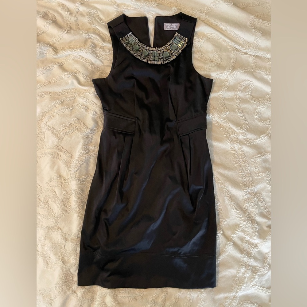Black cocktail dress with gemstone beading detail